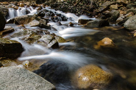 Waterfall and blue streamの写真素材