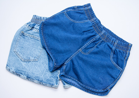 Blue jean shorts with a white backgroundの写真素材