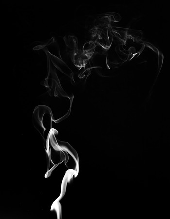 White smoke on black backgroundの写真素材