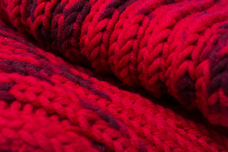 Red silk prom. I knitted a crossing pattern.の写真素材