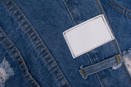 Back of blue jeans with leather label