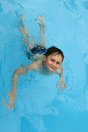 Boy swimmingの写真素材
