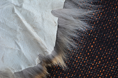 The texture of the fabric large weave and natural fur, brown with place for your textの写真素材