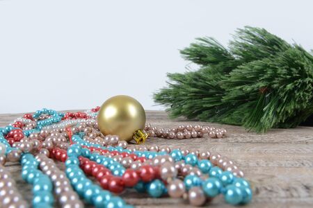 Christmas decorations beads and balls on tableの写真素材