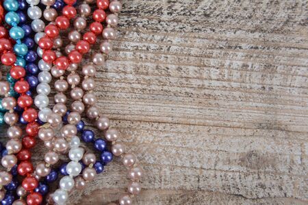 Background of colorful beads on the table. Christmas decorationの写真素材