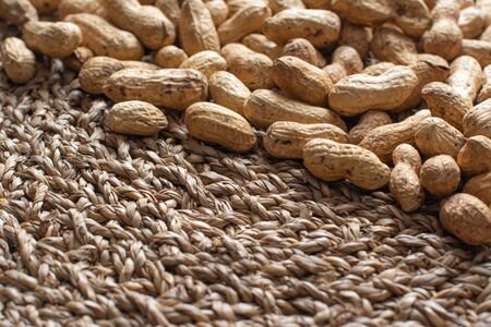 Peanuts on a wicker surfaceの写真素材