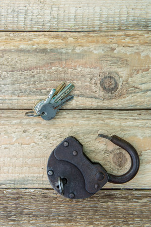 Opened old rusty lock with keys. Copy space. Looking for problem solution conceptの写真素材
