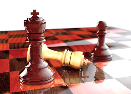 Chess on a board on a white backgroundの写真素材