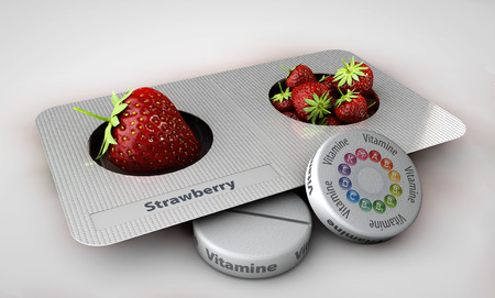 3d Illustration of Close up of Strawberry and pills isolated - vitamin conceptの写真素材