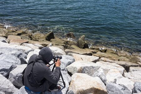 Photographer to concentrate a lot of work 