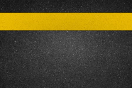 yellow line on road の写真素材