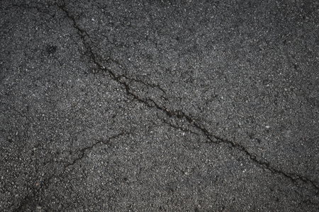 background texture of crack asphalt