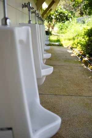 Men's room urinalの写真素材