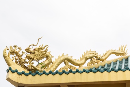 golden dragon on the chinese temple roofの写真素材