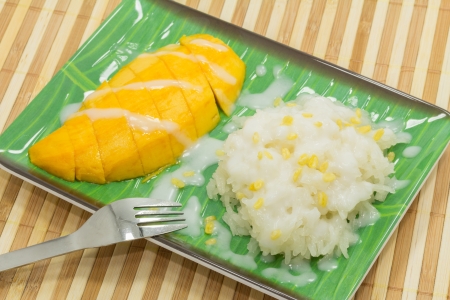 sticky rice in coconut cream with ripe mango の写真素材