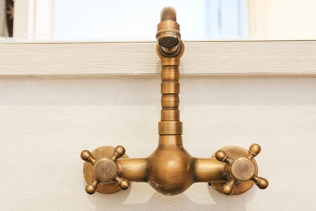 vintage faucet in the bathroomの写真素材