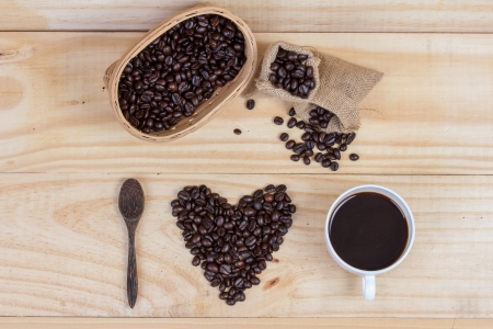 heart shape made from coffee beans spelling i love coffeeの写真素材