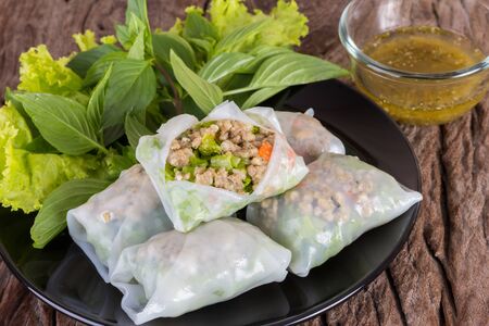 thailand spring roll with spicy sauceの写真素材