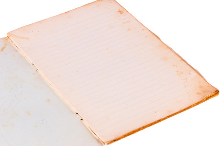 very old open book and empty pages isolated on white backgroundの写真素材