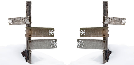 wooden direction sign on the snow isolated on white backgroundの写真素材