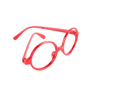 red fashion glasses isolated on whiteの写真素材