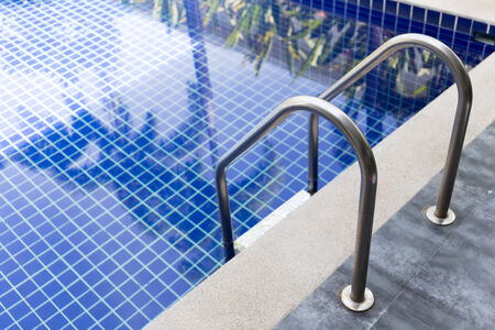 Swimming pool with stair (selective focus)のeditorial素材
