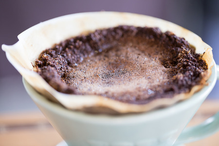 coffee powder in paper filterの写真素材