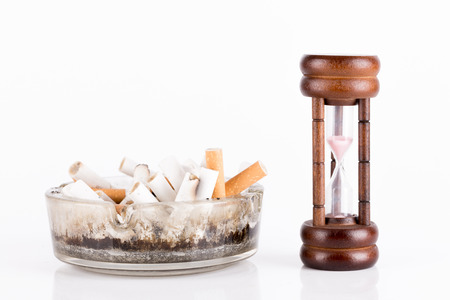 ashtray and cigarettes on white 