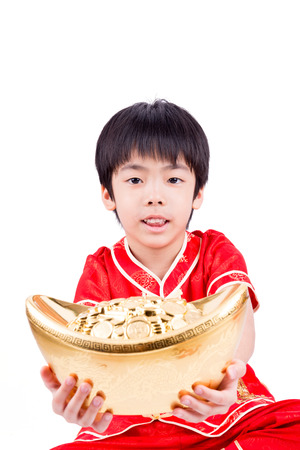 Cute Asian Boy In Tradition Chinese Cheongsam Isolated On White Background : Chinese New Year Conceptの写真素材