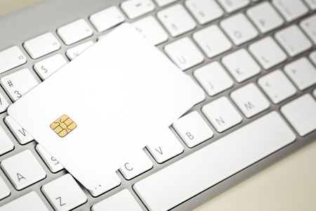 Blank Credit Card With Electronic Chip On Keyboard