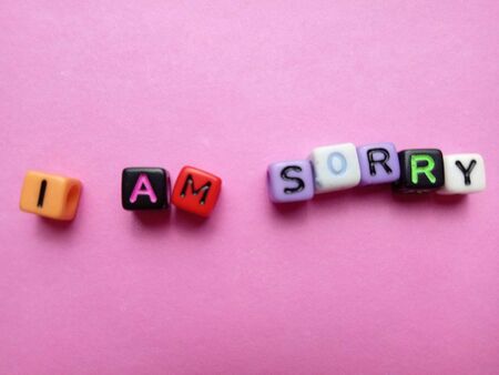 Photo Illustration, Word I am Sorry from plastic alphabet cube beadsの写真素材