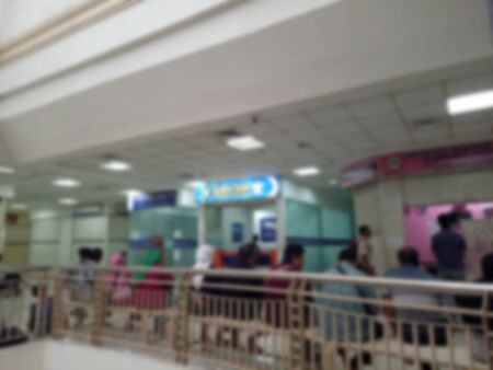 Blur Photo, Sitting and Queueing People for buying someting at Shopping Mallの写真素材