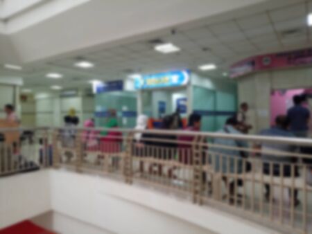 Blur Photo, Sitting and Queueing People for buying someting at Shopping Mallの写真素材