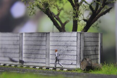 Illustration Photo, Cheap and Easy Sport in the morning, Alone Mini Figure Sport Man Toy at Asphalt Roadの写真素材