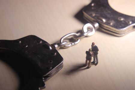 Simple Illustration Photo, NDA, No Disclosure Agreement, Two Man Handshaking make a Illegal Business...