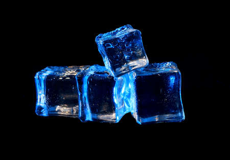 Photo of 5 wet artificial or fake ice cube at Black backgroundの写真素材