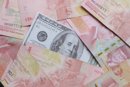 Conceptual Photo 100000 Dollar Beyond Rupiah Beyond paper moneyの写真素材