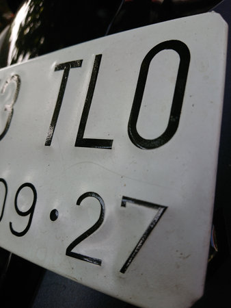 new model indonesia license plate, black number at whiteの写真素材
