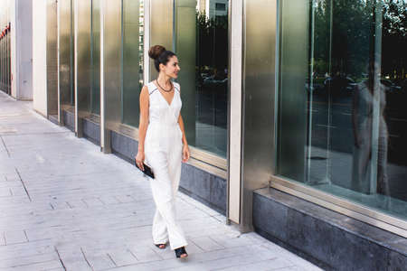Young Trendy Woman Posing In Streetの写真素材