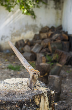 Axe on stump の写真素材