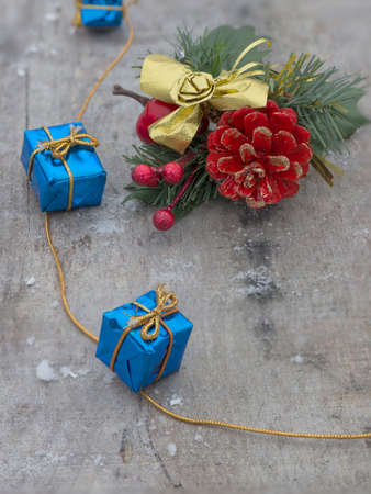 Christmas decoration with presents on wood boardの写真素材