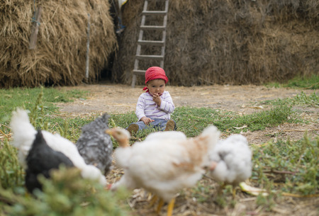 Sweet toddler eating a sweet watermelonの写真素材