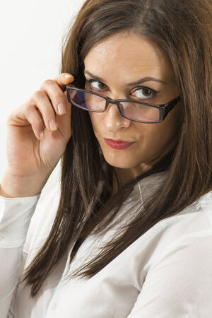 close up of beautiful young woman wearing eyeglassesの写真素材