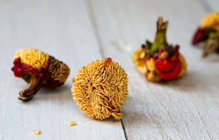 paprika seeds isolated on wood backroundの写真素材