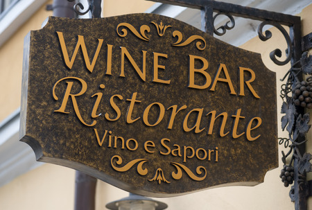 Brasov, Romania, - December 8, 2015: The Wine Bar Ristorante  printed on a buildingのeditorial素材