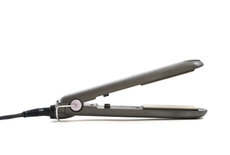 Ceramic hair straightener on white backgroundの写真素材