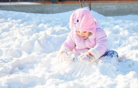 Little girl in snowの写真素材