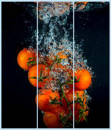 Collage concept with one single photo of a cherry tomatoの写真素材
