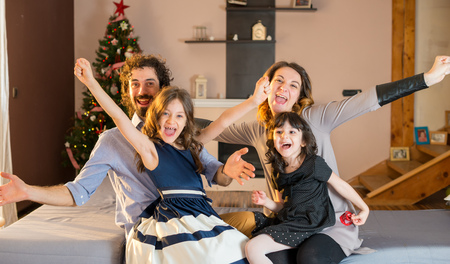 Happy family having fun at home.の写真素材