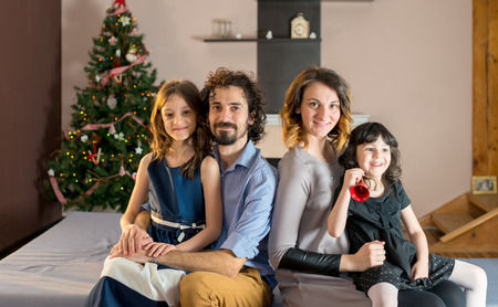 Portrait of a smiling family at Christmas timeの写真素材